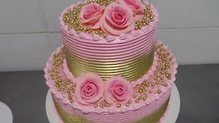 Decoração de bolo rosa e dourado