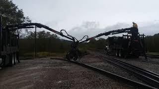 Moving 78 Foot Sticks of Rail with 2 Grapple Trucks