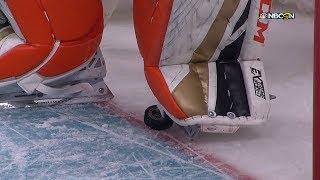 John Gibson steps on the puck on the goal line to deny Scheifele