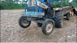 Tractor Stuck in sand.