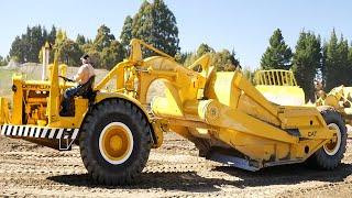 Caterpillar CAT DW21 Motor Scraper Operating at Wheels at Wanaka 2023