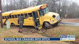 School bus overturns in Lee County