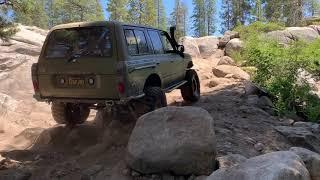 FJ80 Land Cruiser climbing The Staircase at Slick Rock