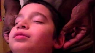 Professional Head/Cosmic Energy Massage on a Child by Oudin - oudinhealinghandsmassagetherapy.com