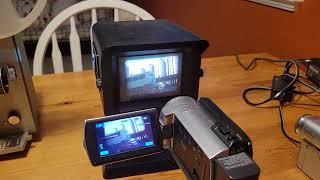 Bell & Howell super 8 film projector with Video-Cine Converter and Sony Camcorder