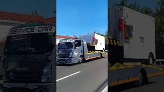 TRUK TOWING ISUZU MUATAN GENSET LISTRIK SANGAT BESAR MELAJU CEPAT #shorts #trending #subscribe