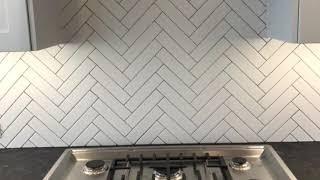 Herringbone Backsplash Completed #herringbonepattern #herringbonetile #herringbone #tiletrends