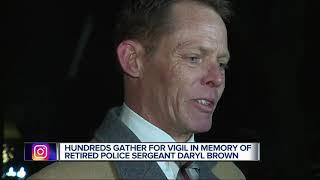 Hundreds gather for vigil in memory of retired police sergeant