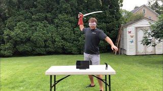 Smashing iPad with a Sword (sword Vs tablet)