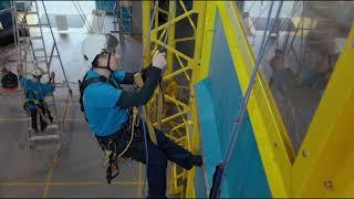 Abseiling Over a 90 degree Parapet Edge on our new tower.