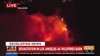 Devastation in Los Angeles area continues as multiple wildfires burn