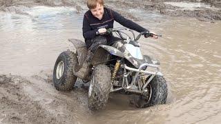 KIDS ATV QUAD DRIFTING AND DONUTS IN MUD.