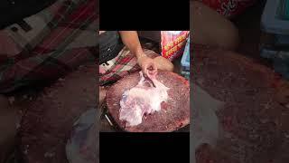 Goat meat cutting and selling shop in the market