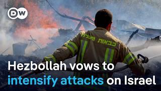 Hezbollah fires huge barrage of missiles into northern Israel | DW News