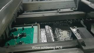 Wave Soldering Process for Electronics Manufacturing.  PCB Through-Hole Assembly