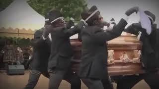 Black men dancing with coffin meme