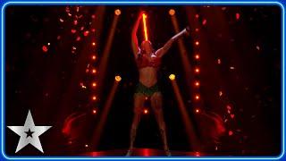 Heather Holliday SWALLOWS light-up SWORD in saucy performance! | Semi-Finals | BGT 2024