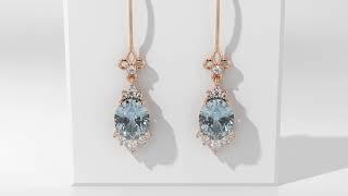 Stunning aquamarine and diamond drop earrings designed by Larsen Jewellery