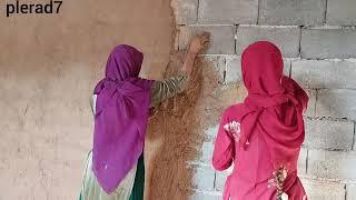 Having twowives & an betrayal husband problems in building of a nomadic hut for first wife
