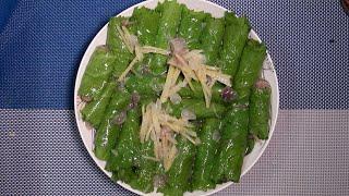 Steamed Bronze Featherback Stuffed in Mustard Leaves