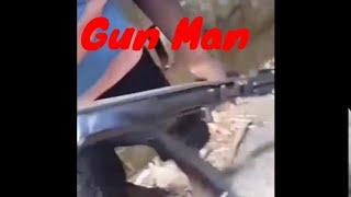 Gun Man Showing Off His Guns In Trinidad and Tobago