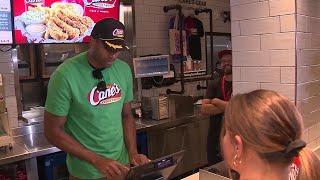 Al Horford serves up tenders at Raising Cane's in Boston