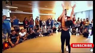 Watch this couple in a romantic Latin dance performance.