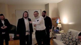 Yoneson Shwartz & Shimon Yoel Klein, Lifting Up A Patient