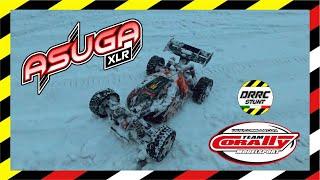 Team Corally Asuga XLR 6s drifting in the snow