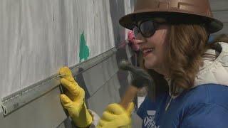 WFRV Local 5's Lisa Malak, Millaine Wells participate in the Habitat for Humanity International Wome