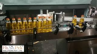 Automatic #Oil filling, capping and labeling machine, #oilfillingmachine - Filsilpek - +919054294961