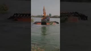 JCB under water