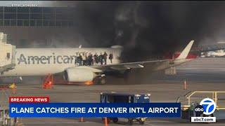 American Airlines plane catches fire at Denver airport, passengers evacuated