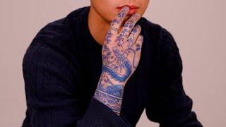 Hand on Blue Dragon Tattoo. [OOZYTATTOO]