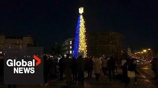 Kyiv lights Christmas tree with power generators as symbol of defiance