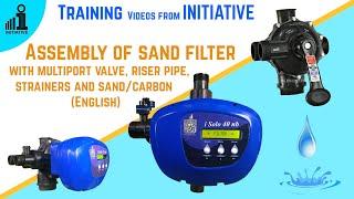 Assembly of sand filter with multiport valve, riser pipe, strainers and sand/carbon [English]