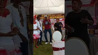 John Njahi performing at Njeri wa Uji's Dad Housewarming