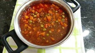 ( Bazella w riz ) lebanese food carrots , green peas