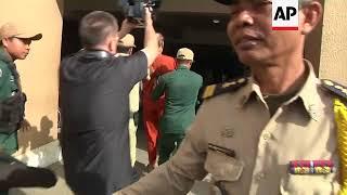 Australian filmmaker Ricketson arrives at court in Phnom Penh