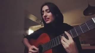 An Irani women sings a Persian song with a beautiful voice.