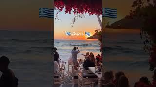  Greece A seaside restaurant on the island of Mykonos in the sunset rays 