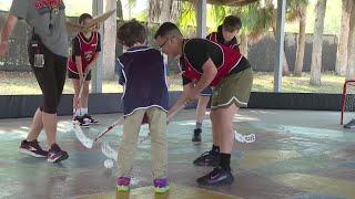 Florida Panthers provide floorball equipment to Calusa Elementary