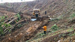 CAT D6R XL Bulldozer Cuts New Road in Mountains During Heavy Rain