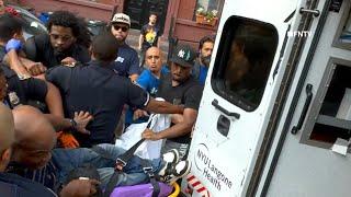 CHAOS as Police take  Suspect into Custody after Decomposing Woman's Body fount on NYC Sidewalk