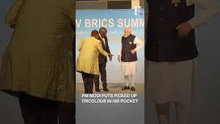 PM Modi Picks Up Tricolour Kept on Floor to Mark His Spot at BRICS Summit | Subscribe to Firstpost