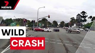 Dash cam footage reveals red light road rage | 7NEWS