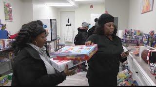 Allie B's donates toys from future grocery store