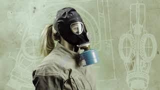 Woman puts on gas mask