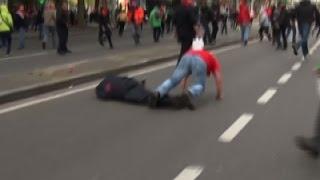 Raw: Protester Knocks Out Brussels Police Chief