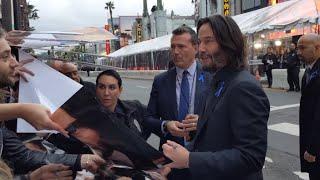 Keanu Reeves loves his fans - Hollywood Movie premiere -  John Wick premiere Los Angeles